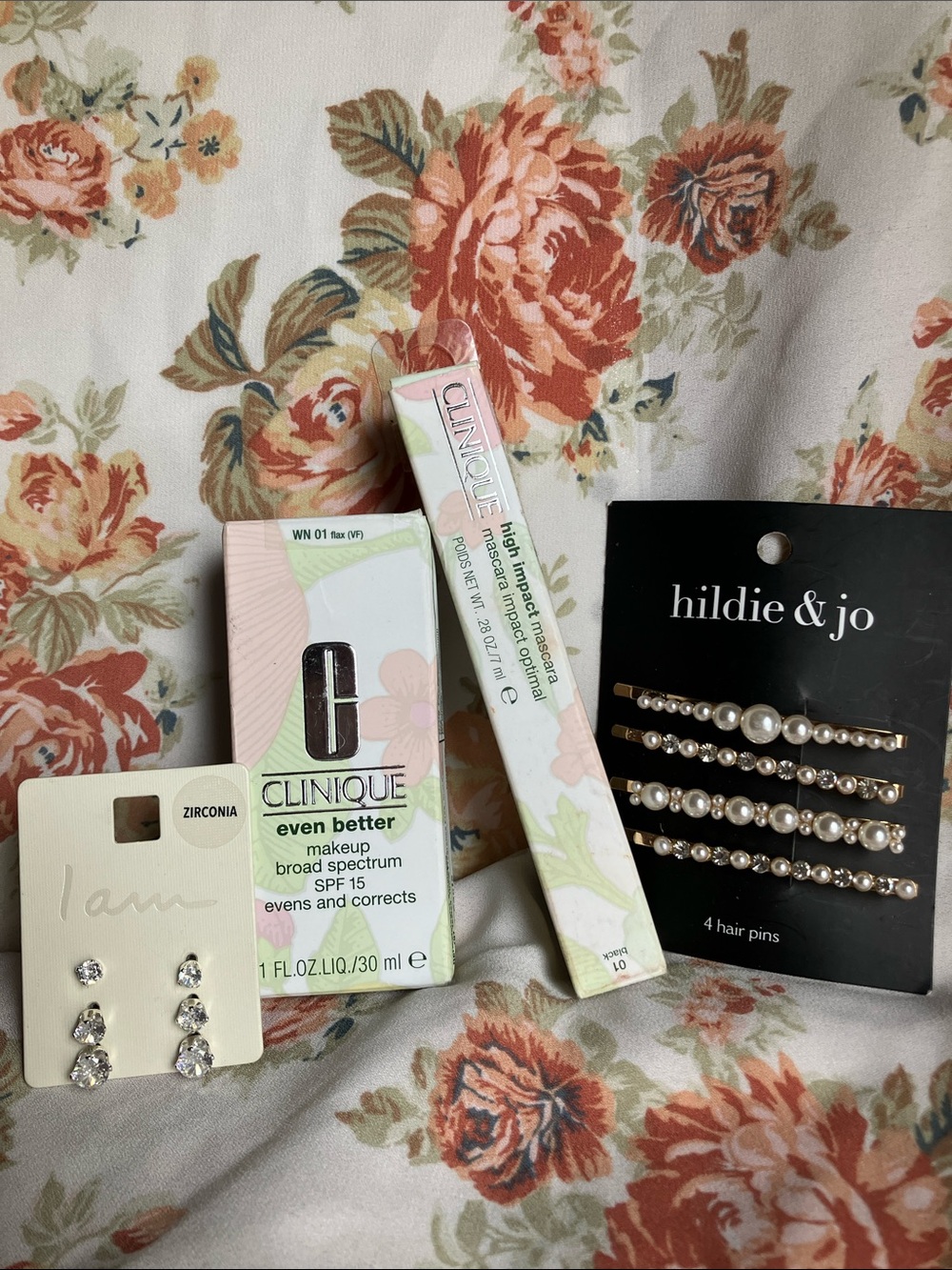 Clinique makeup and mascara bundle in pink, white, gold&FREE earrings& hair pins
